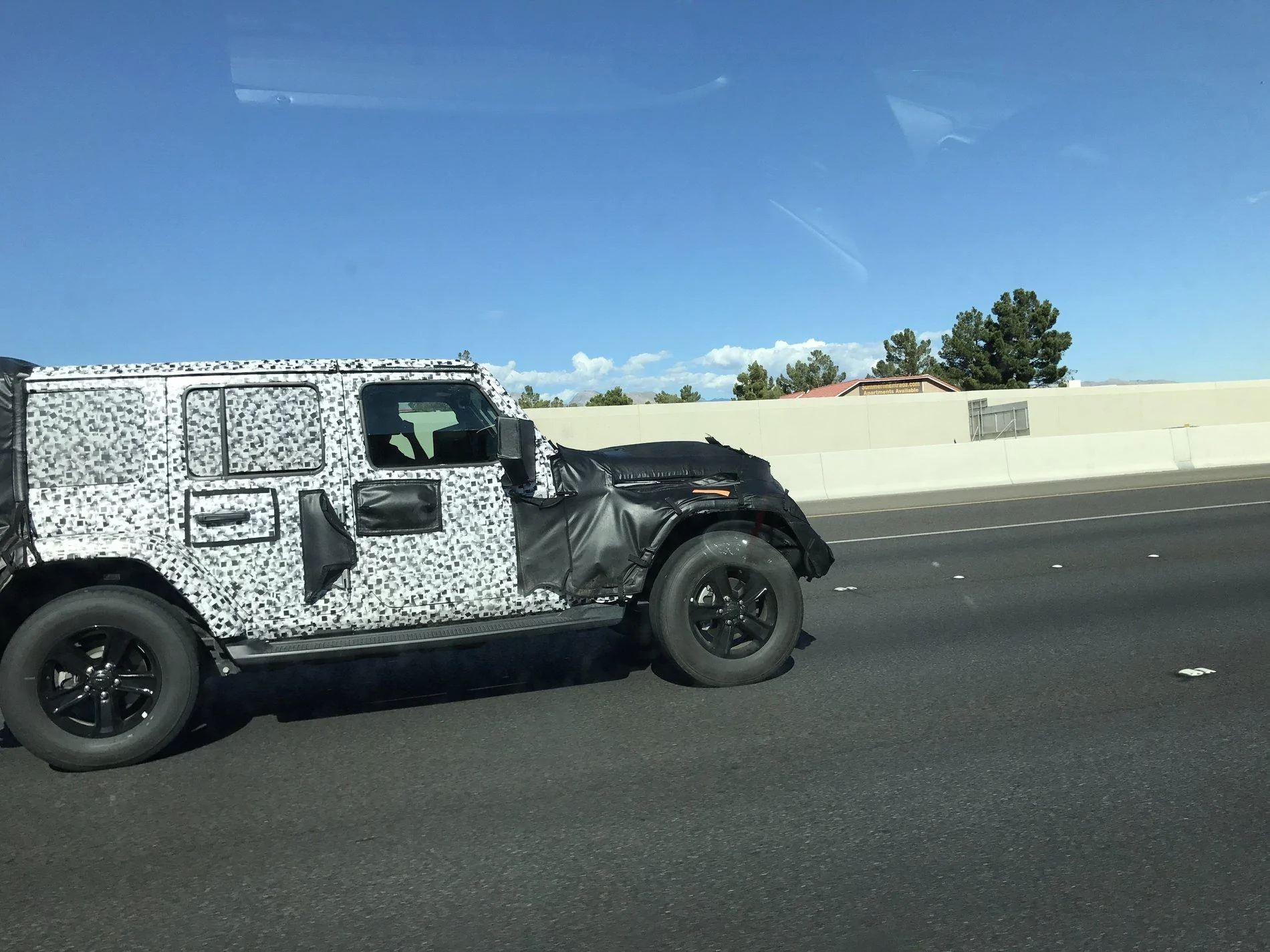 Jeep Gladiator Camo drops off JLU prototypes, showing door handles jeepvegas