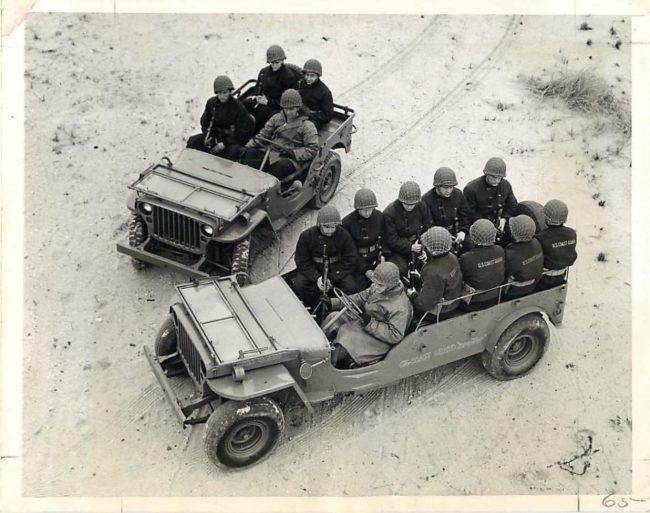 Jeep Gladiator Gladiator soft top, doorless, windshield down driving 1944-01-17-coast-guard-invader-jeep1-650x513