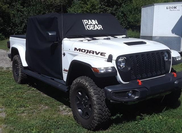 Jeep Gladiator Field expedient cab rain cover: $10, a box cutter, 4 stretch cords raingear cover