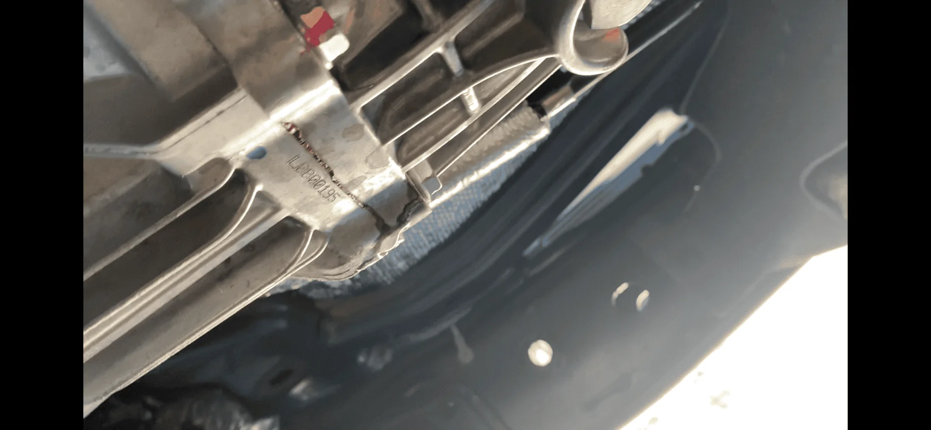 Jeep Gladiator Clear Liquid dripping from bottom of transmission.  Leaving light stains on concrete.  What is this?  AC condensate? IMG_3407