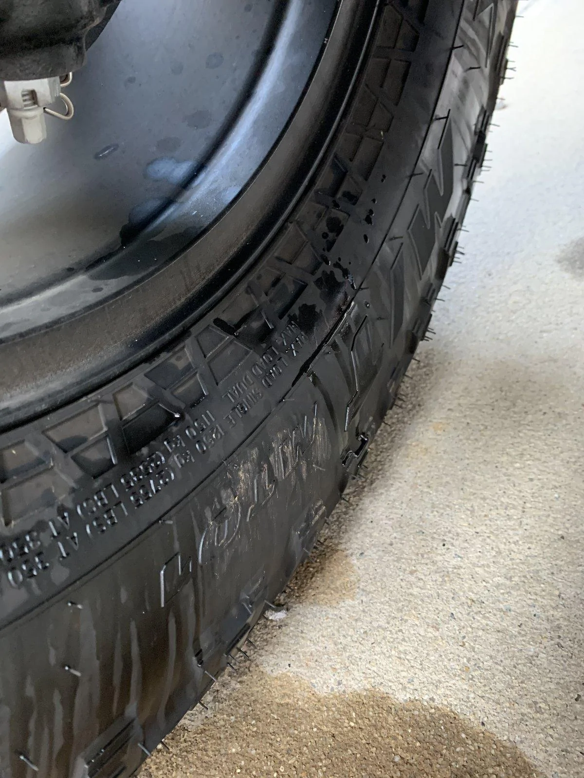 Jeep Gladiator Clear Liquid dripping from bottom of transmission.  Leaving light stains on concrete.  What is this?  AC condensate? IMG_3411