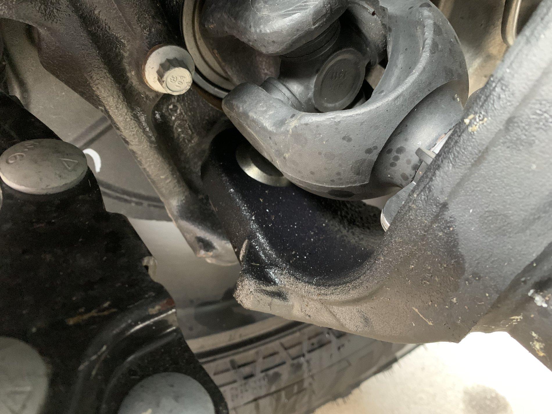 Jeep Gladiator Clear Liquid dripping from bottom of transmission.  Leaving light stains on concrete.  What is this?  AC condensate? IMG_3413