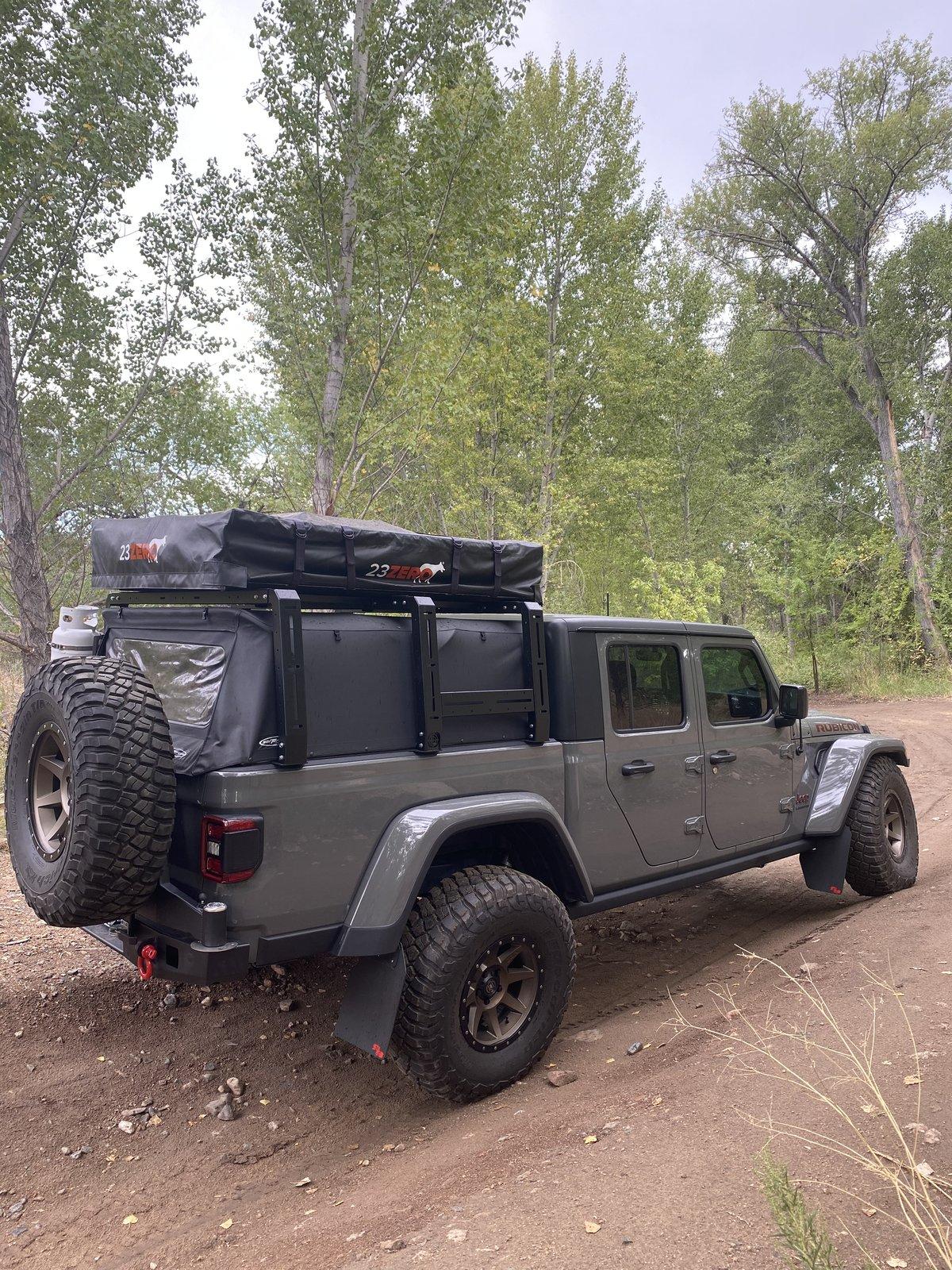 Jeep Gladiator Gladiator dual swing rear bumper prototype renderings. BA2710BC-A2F9-466D-817F-EC50FE469614