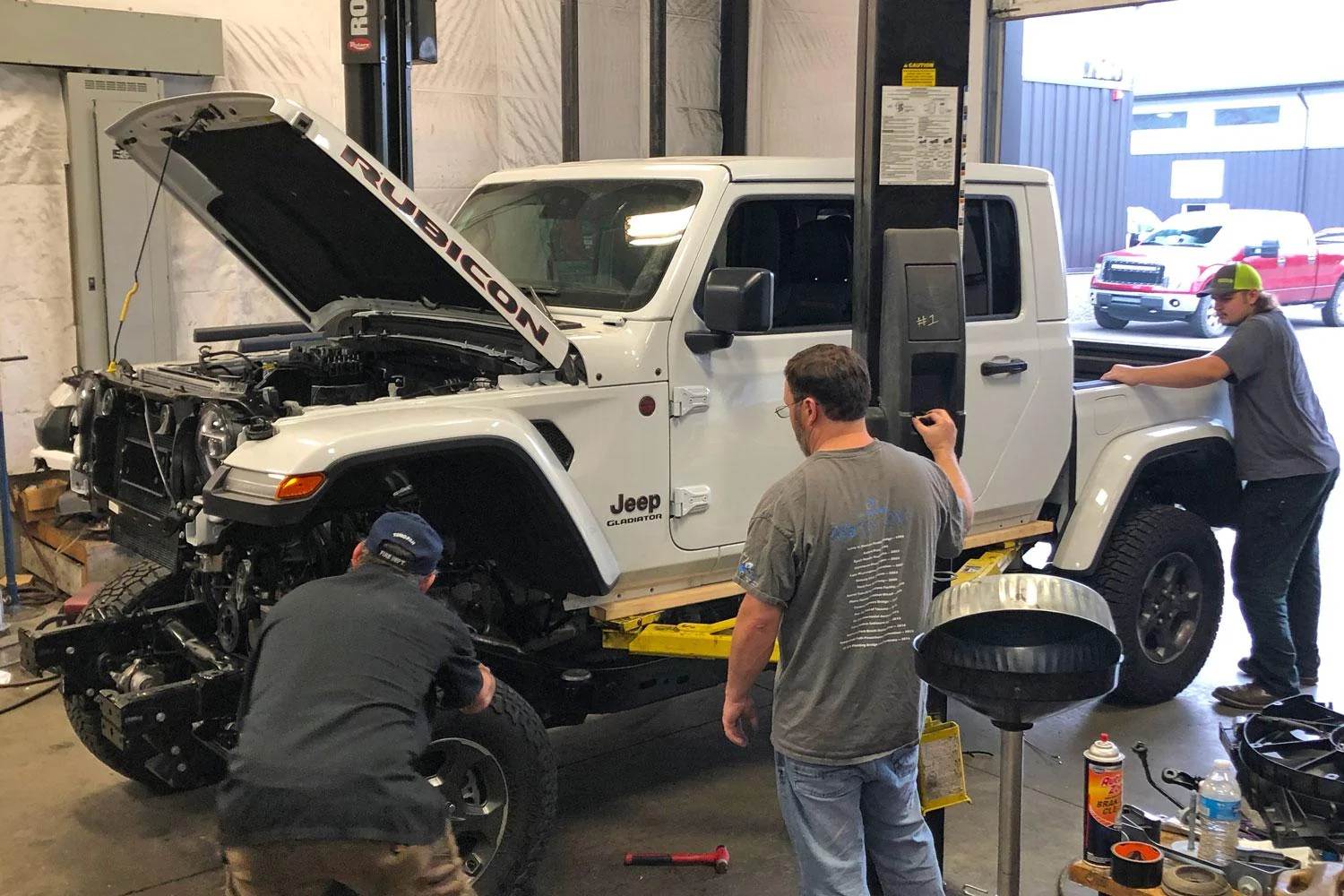 Jeep Gladiator Another Hemi swap at Northridge4x4. lowering-cab-onto-hemi-chassis