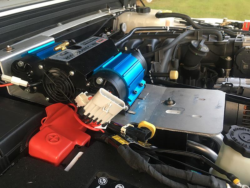 Jeep Gladiator Under the hood ARB compressor mount with remote air chuck/rocker switch/air filter relocation brackets. compressor-only