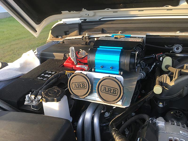 Jeep Gladiator Under the hood ARB compressor mount with remote air chuck/rocker switch/air filter relocation brackets. filters-front