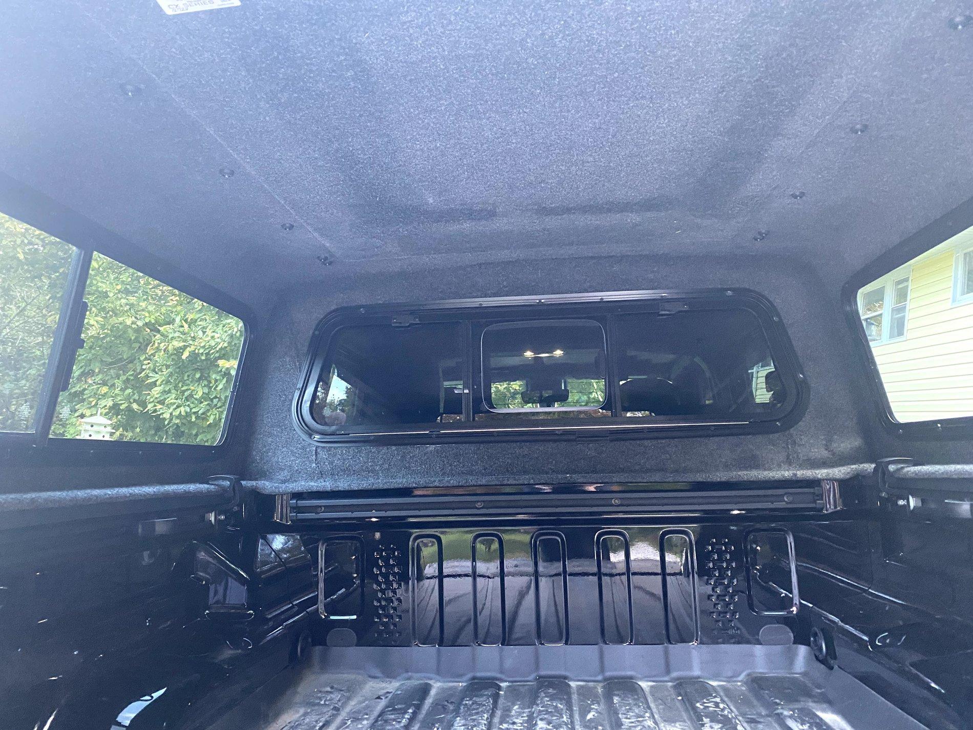 Jeep Gladiator My Black Overland with ARE CX cap with Yakima Rack. IMG_6859
