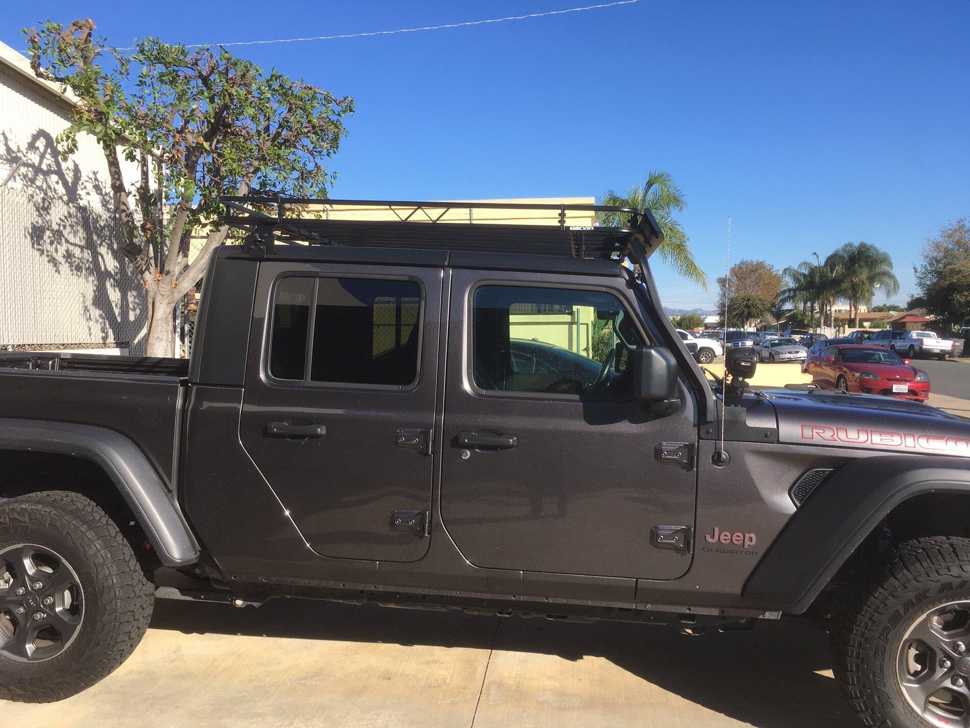 Jeep Gladiator Anyone come up with a way to mount an awning over the side doors yet? 47919AF5-1CAA-4F1B-BE16-EF9D0DDA74AB