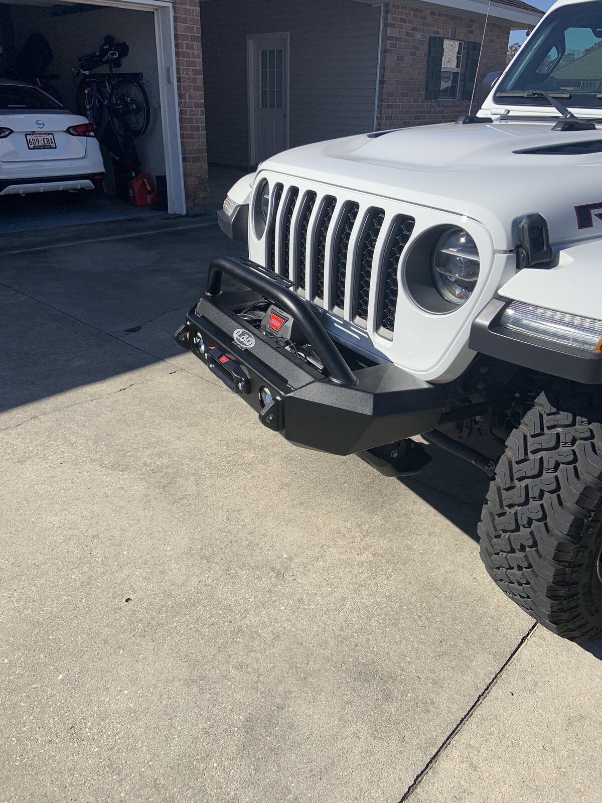 Jeep Gladiator Aftermarket front bumper that uses both the OEM fog lamps and OEM red tow hooks? IMG_5909