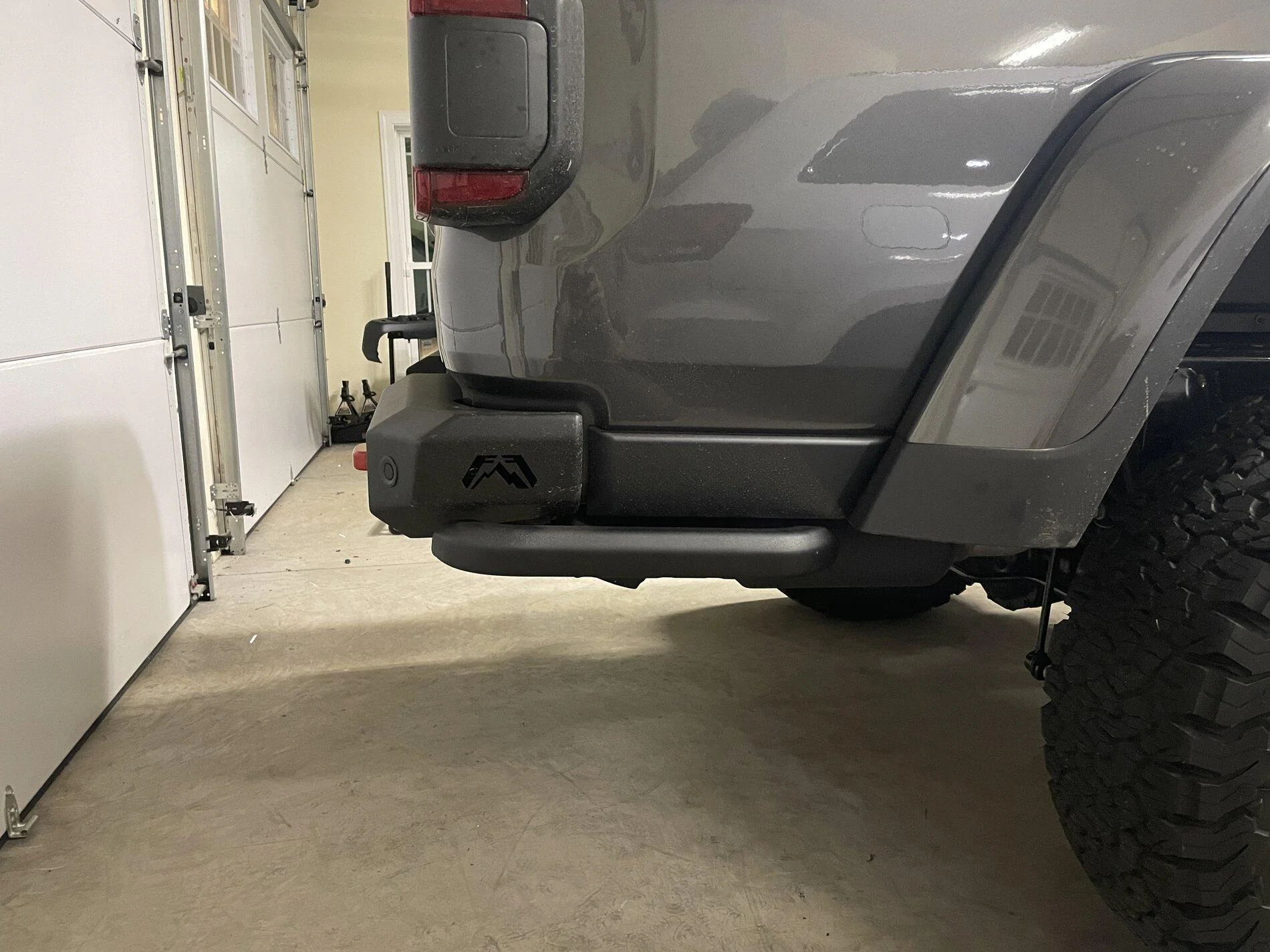 Jeep Gladiator Re-adding the OEM Rubicon rear rock sliders after a Fab Fours bumper install IMG_1282