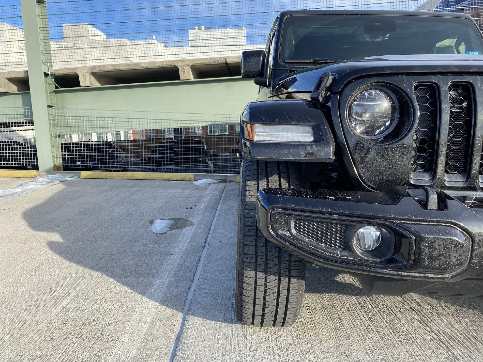 Jeep Gladiator High Altitude's with bigger rubber on stock wheels Front OEM.JPEG