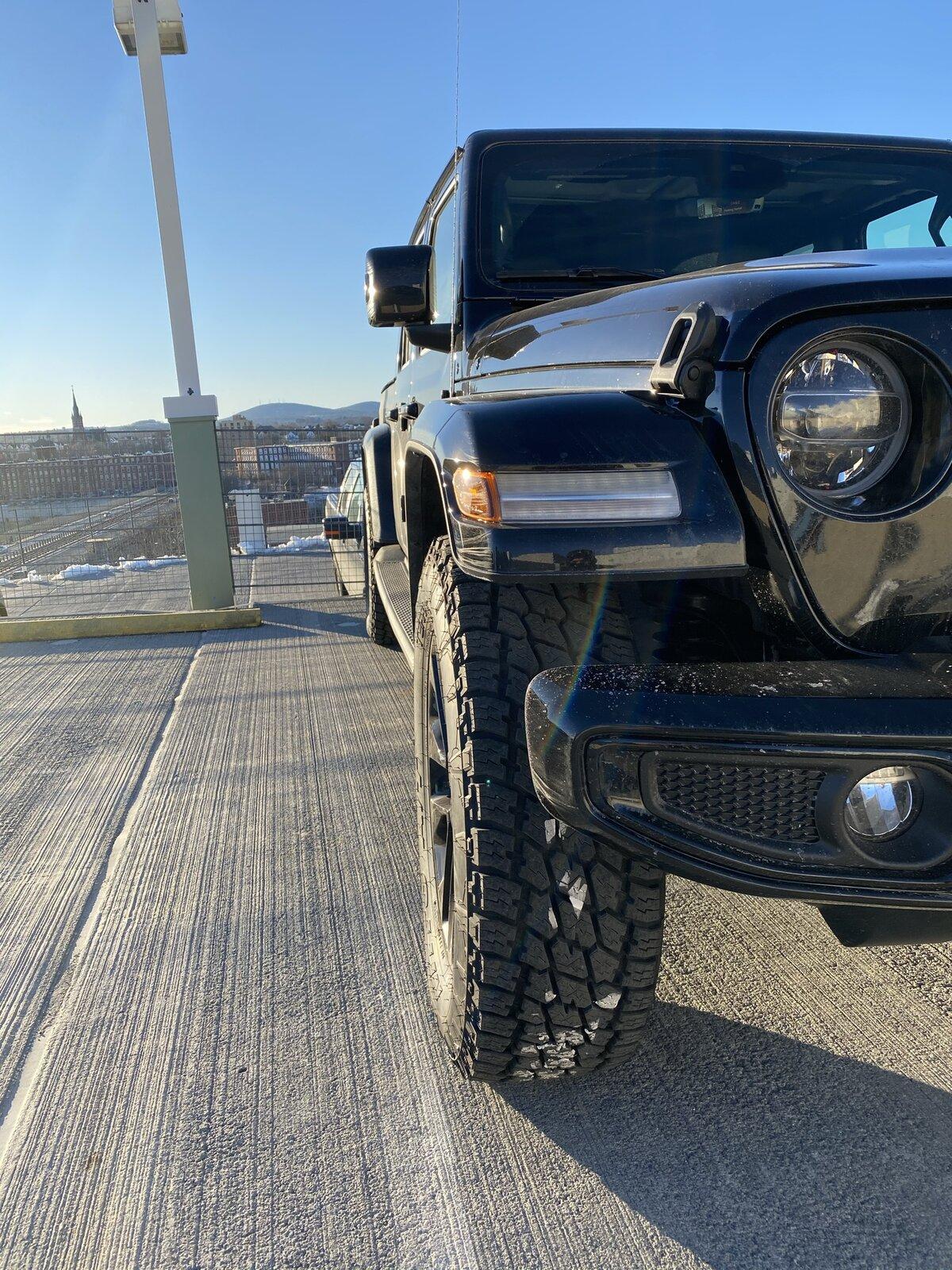Jeep Gladiator High Altitude's with bigger rubber on stock wheels Front New.JPEG