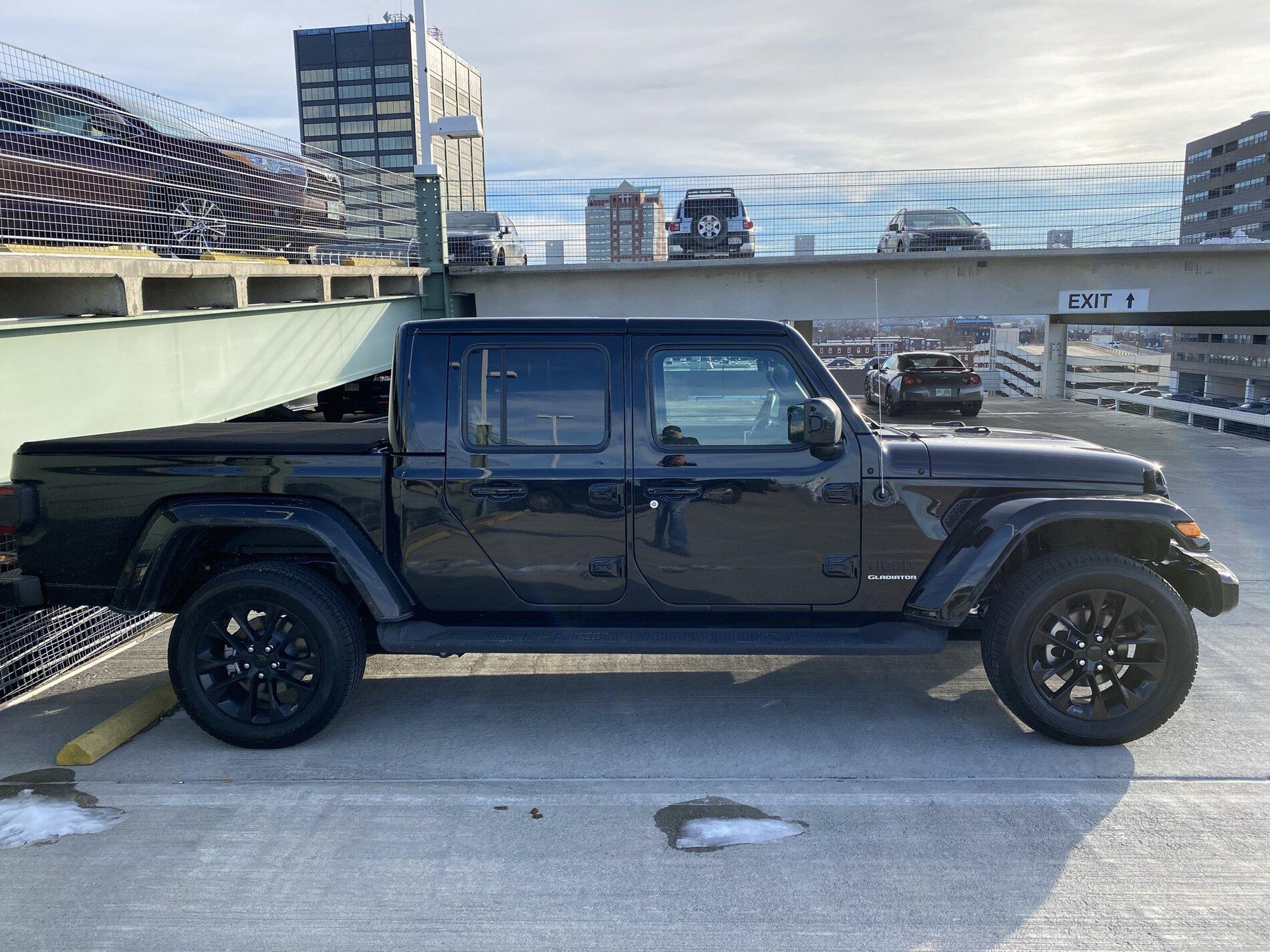 Jeep Gladiator High Altitude's with bigger rubber on stock wheels Side OEM.JPEG