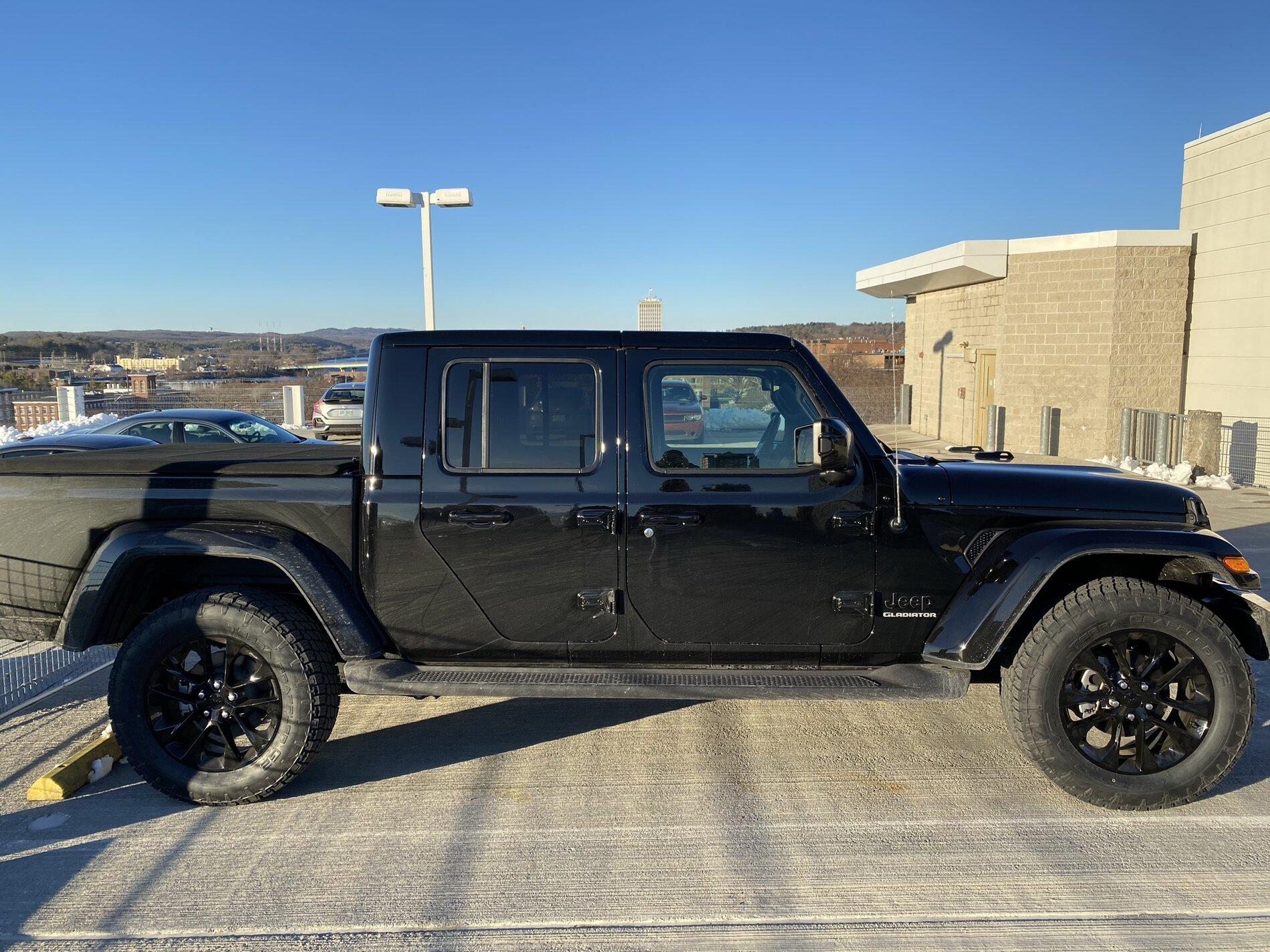 Jeep Gladiator High Altitude's with bigger rubber on stock wheels Side New.JPEG