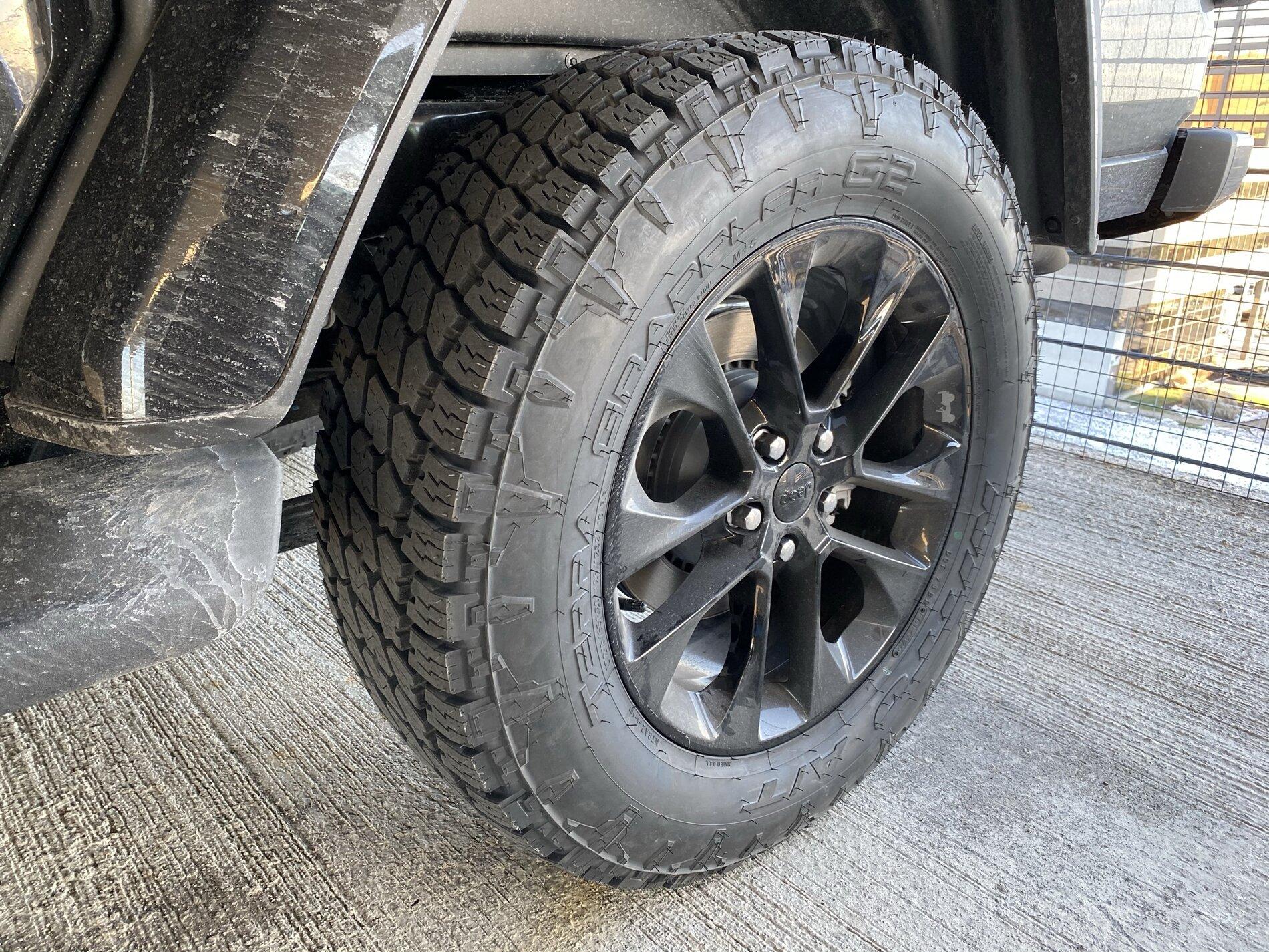 Jeep Gladiator High Altitude's with bigger rubber on stock wheels Close Up.JPEG