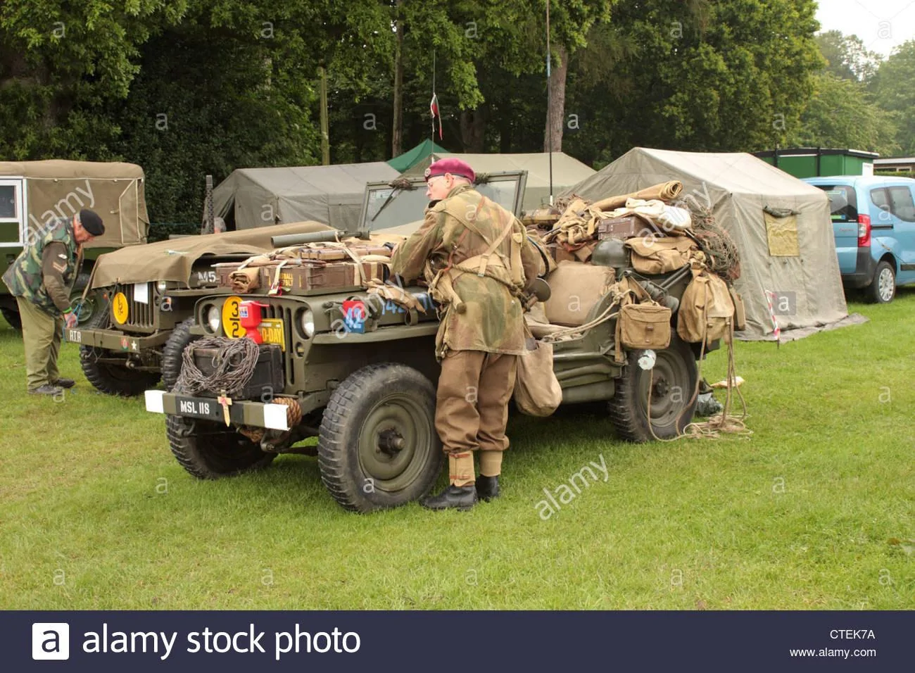 Jeep Gladiator Car And Driver - Gladiator vs Colorado vs Ranger vs Ridgeline a-willys-jeep-loaded-up-as-they-were-on-d-day-CTEK7A