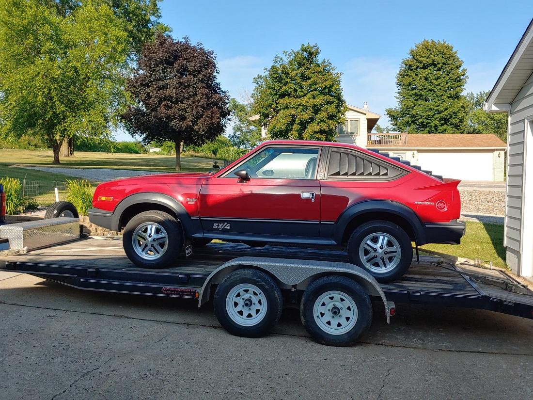 Jeep Gladiator Towing a car car-on-trailer