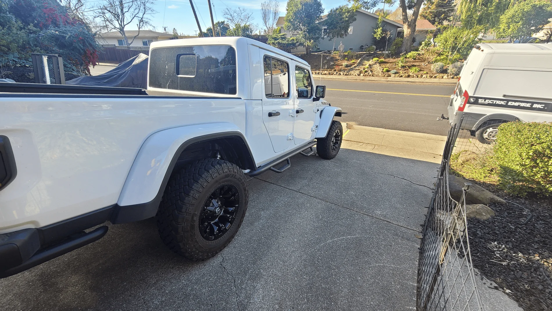 Jeep Gladiator Mudflaps that flare out at wheel wells, rather than... 1612550709137