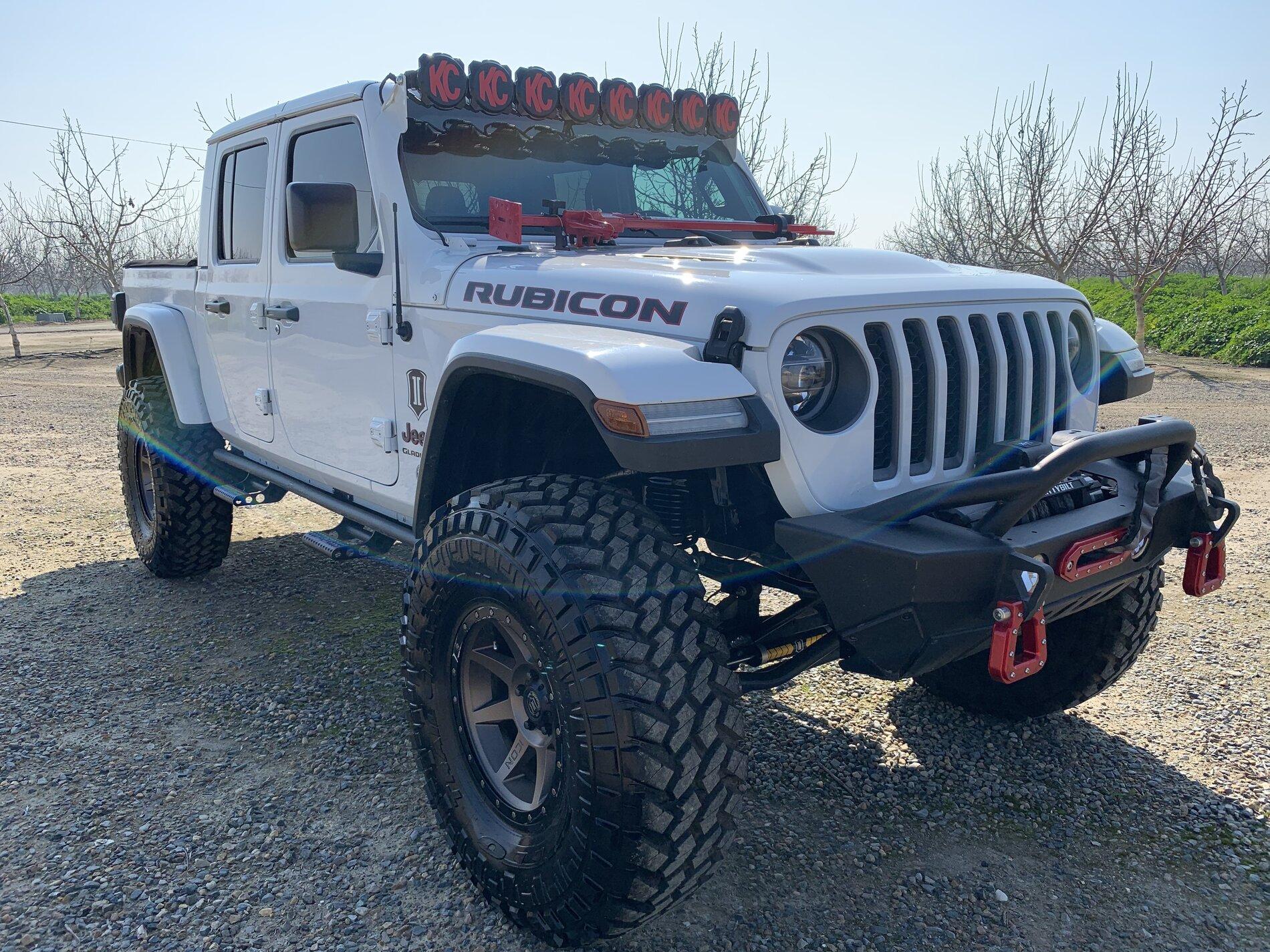 Jeep Gladiator Lets see all those Gladiators with lifts and bigger tires! 07348F6C-0288-41D3-A14D-41597520AA43