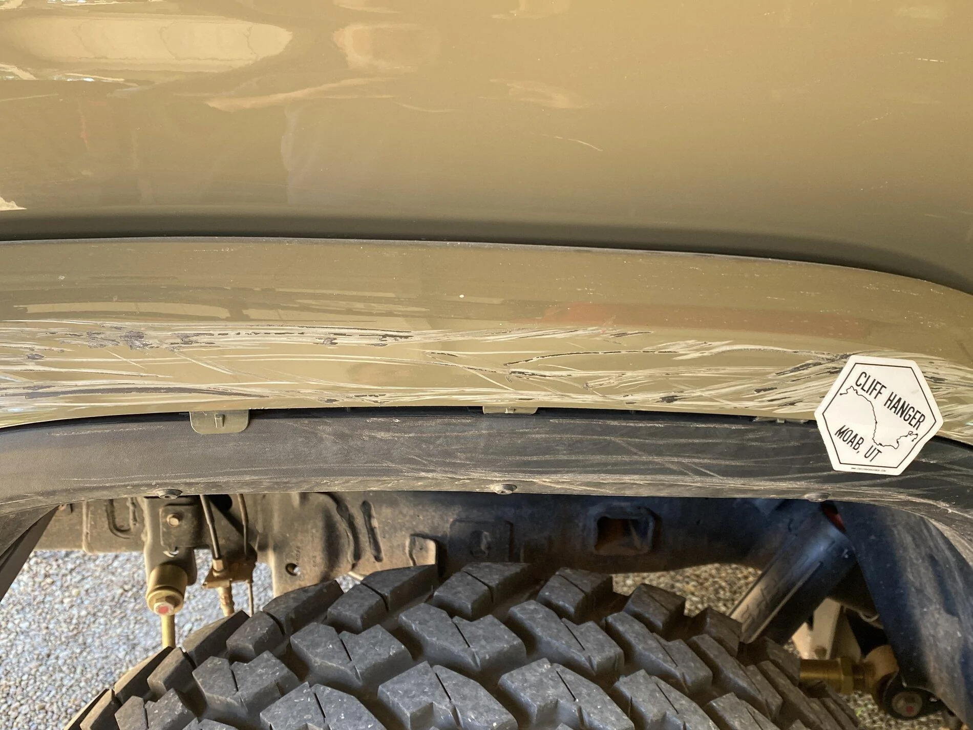 Jeep Gladiator Cliff Hanger - one fender and some rocker dings. IMG_1293