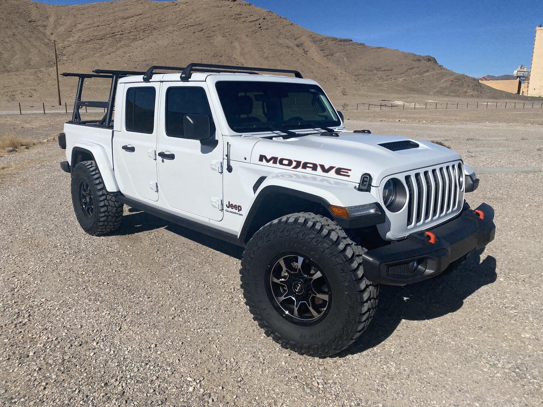 Jeep Gladiator 37’s on stock Mojave, no lift. 7F882387-9B82-4CD6-B62E-F53499142402