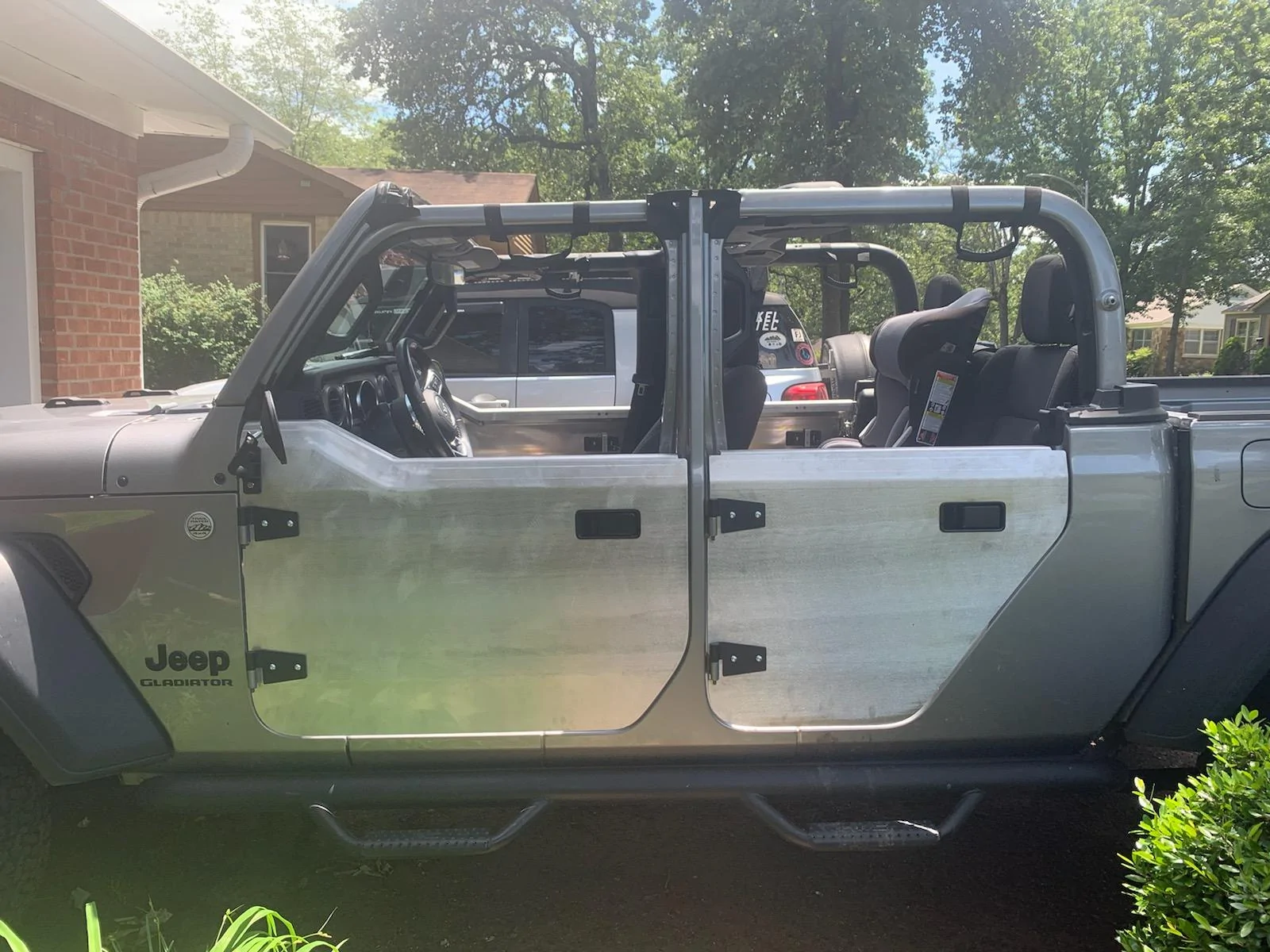 Jeep Gladiator Any photos of JCR Half Doors on JT? JCR Clos