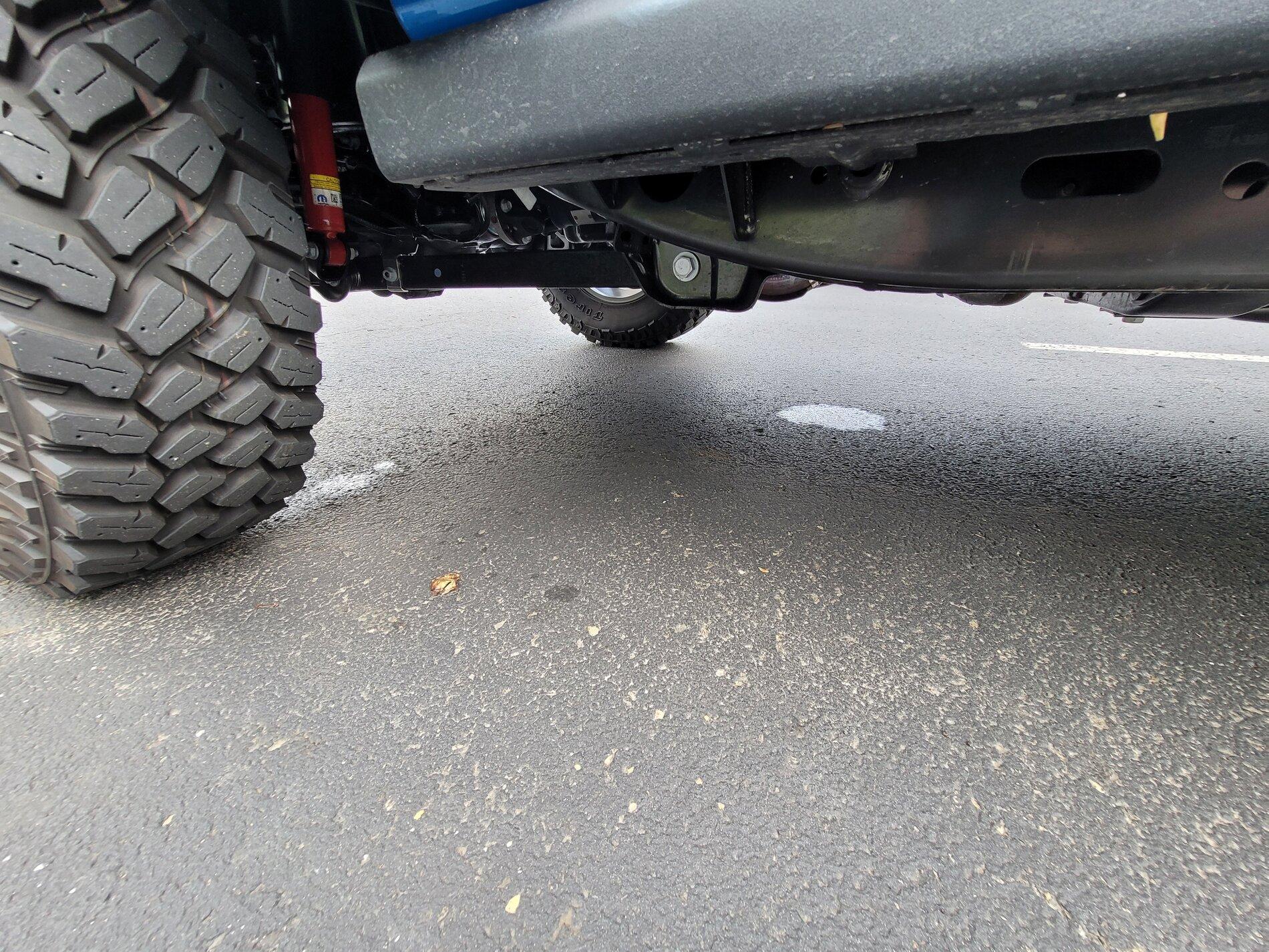 Jeep Gladiator Front left suspension feels notchy, and leaking liquid when parked 20210702_162539
