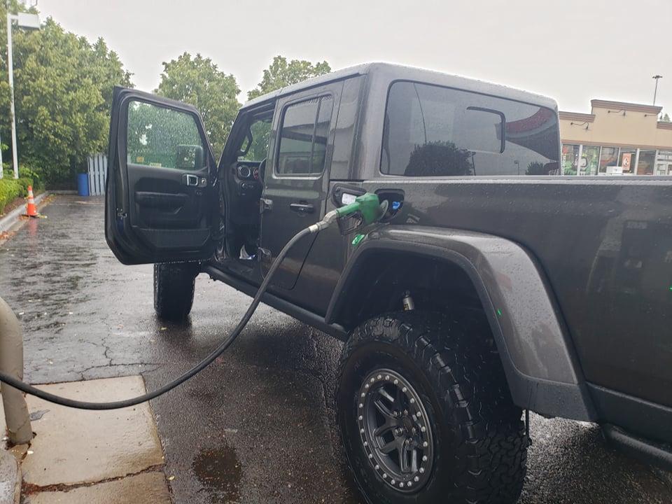 Jeep Gladiator UPDATE: DELIVERED!! Rubicon Diesel: Factory order and Modifications from AEV help with some decisions, tires, wheels, transmission, transfer case pic glad side filling up diesel 205151284_217935853579335_7740854688994329654_n