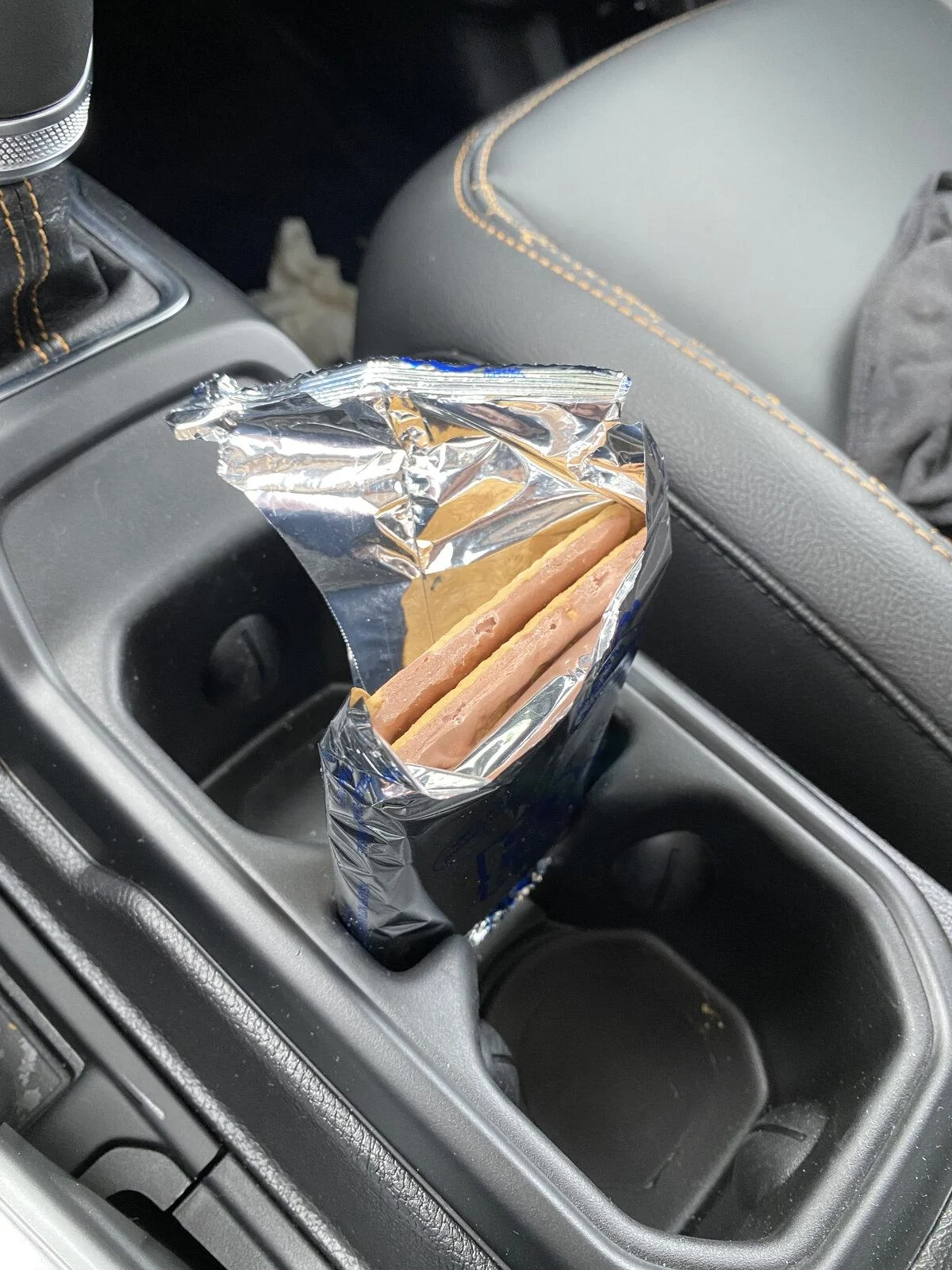 Jeep Gladiator What’s the space between the cup holders for? (Wrong answers only) 9E2E8B29-7F1C-4469-8FE4-F3BF9948D4C9