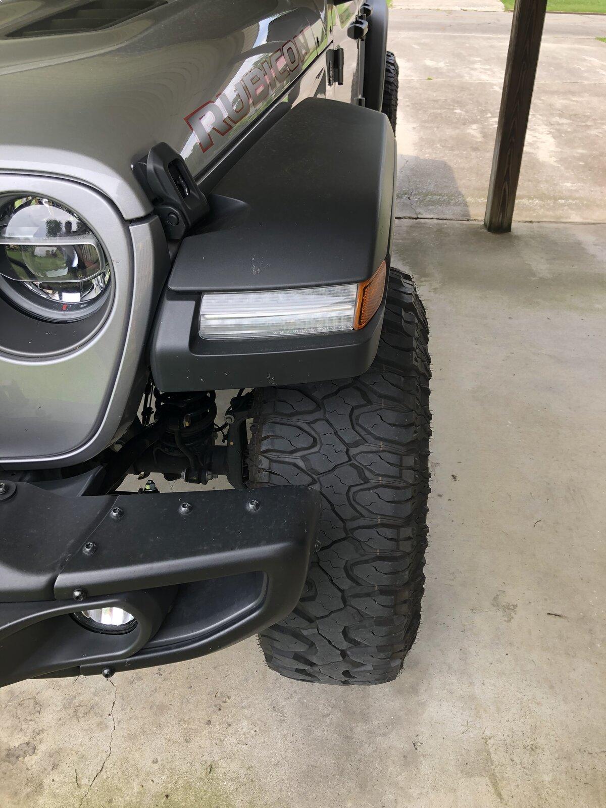 Jeep Gladiator Lets see your wheel poke 2B8CF436-397B-459A-A695-70C2B677DE55
