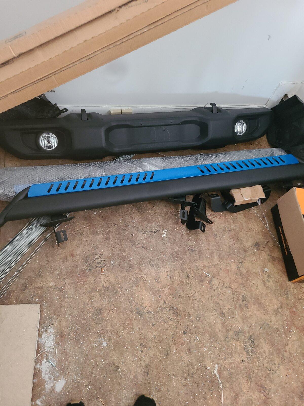 Jeep Gladiator Led halo fogs. Interior leather mats. Blue nerf bars. Sport front bumber with aero pieces and all hardware. Stock taillights 20210719_075347