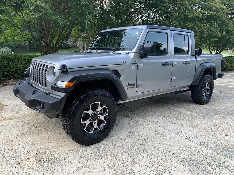 Jeep Gladiator Show me your sport and sport s with factory wheels and 33s. 51294479509_607d3ac630_c