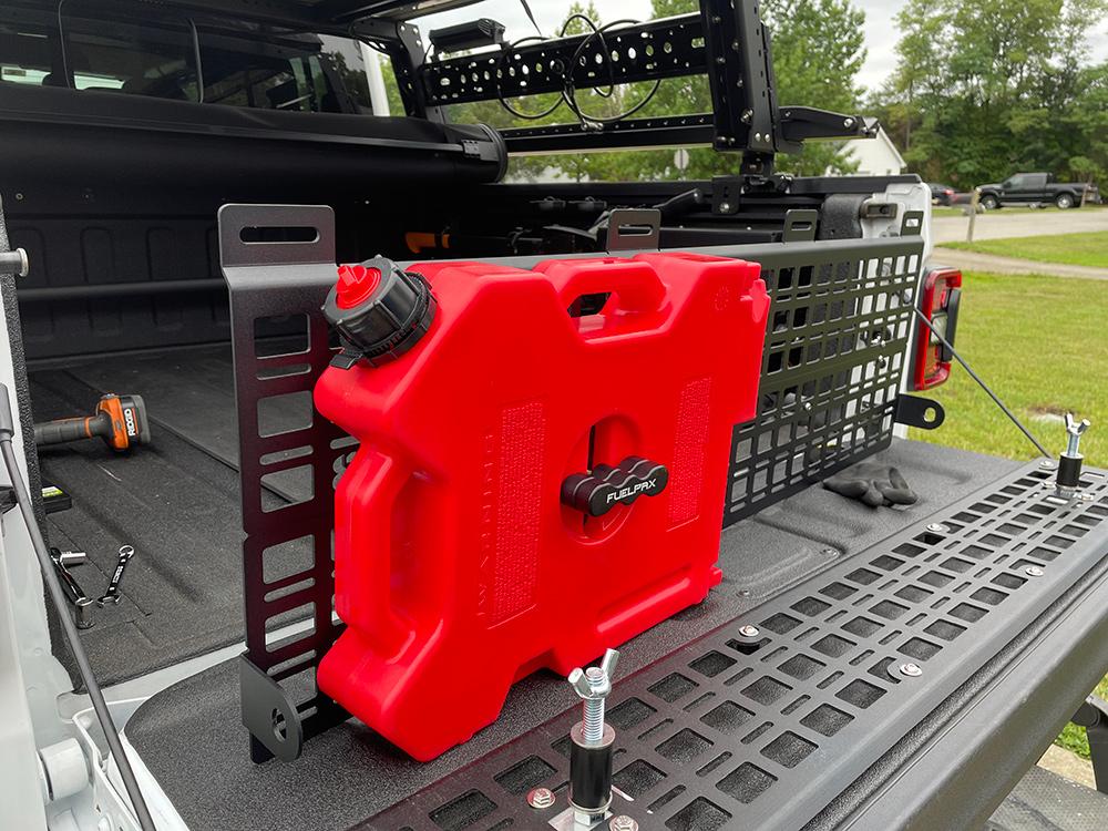 Jeep Gladiator Who has Molle Panels in their Bed (Photos) cab-side-molle-panel-rotopax-2gallon