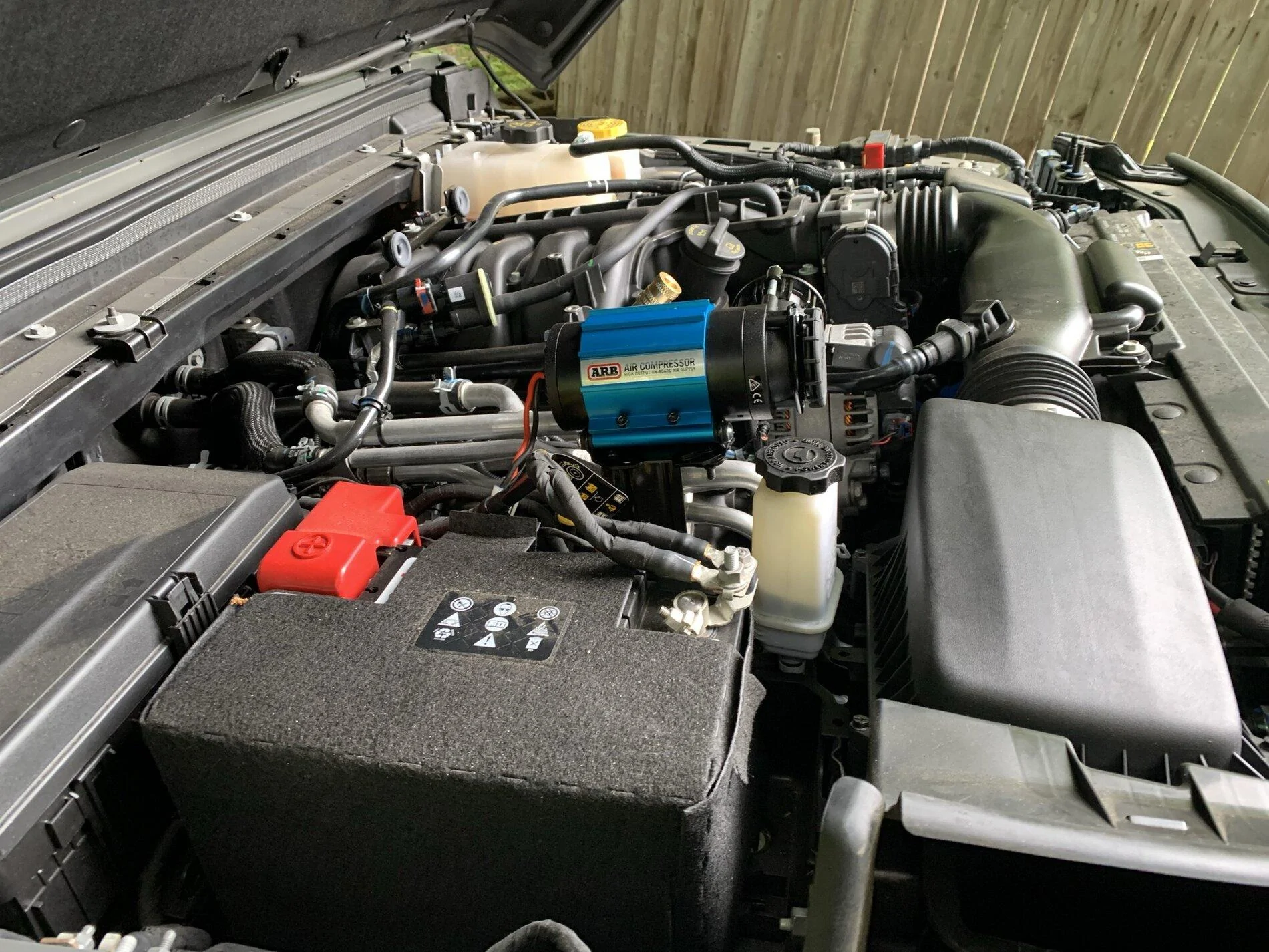 Jeep Gladiator ARB CKMA12 compressor install using the engine cover mount IMG_4063