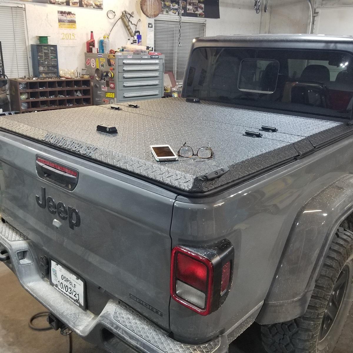 Jeep Gladiator Sting Gray build; Jeep #79 topper 1