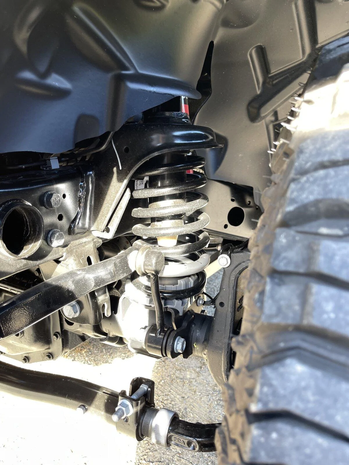Jeep Gladiator Eco diesel Suspension bottoming out on normal roads IMG_2374