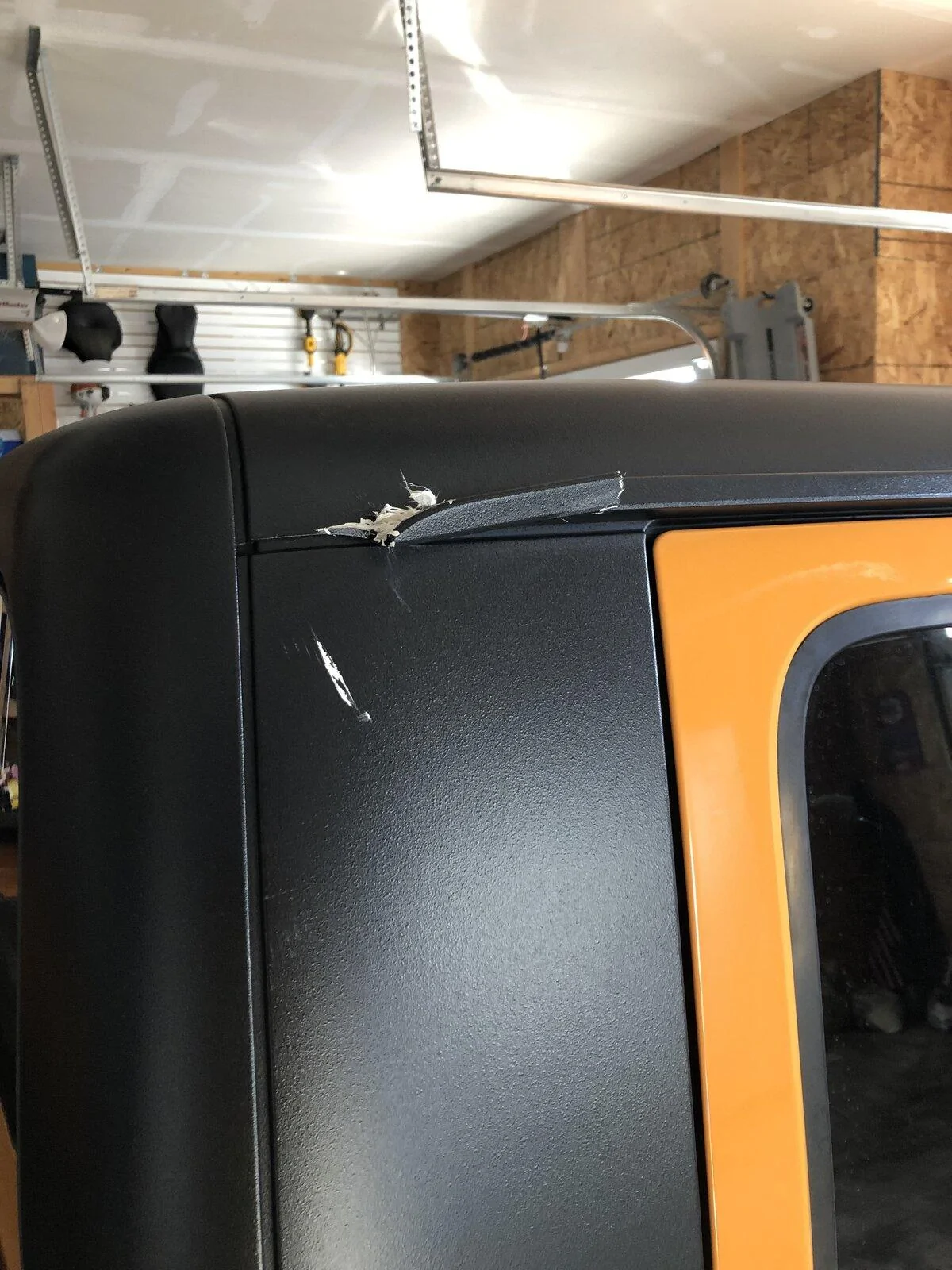Jeep Gladiator Damaged gutter rail on Freedom Top IMG_3429