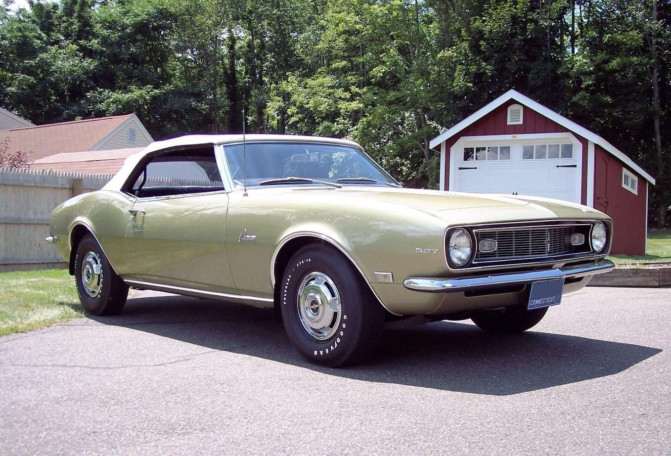 Jeep Gladiator Buying a car for a family member when they get old enough to drive Camaro front