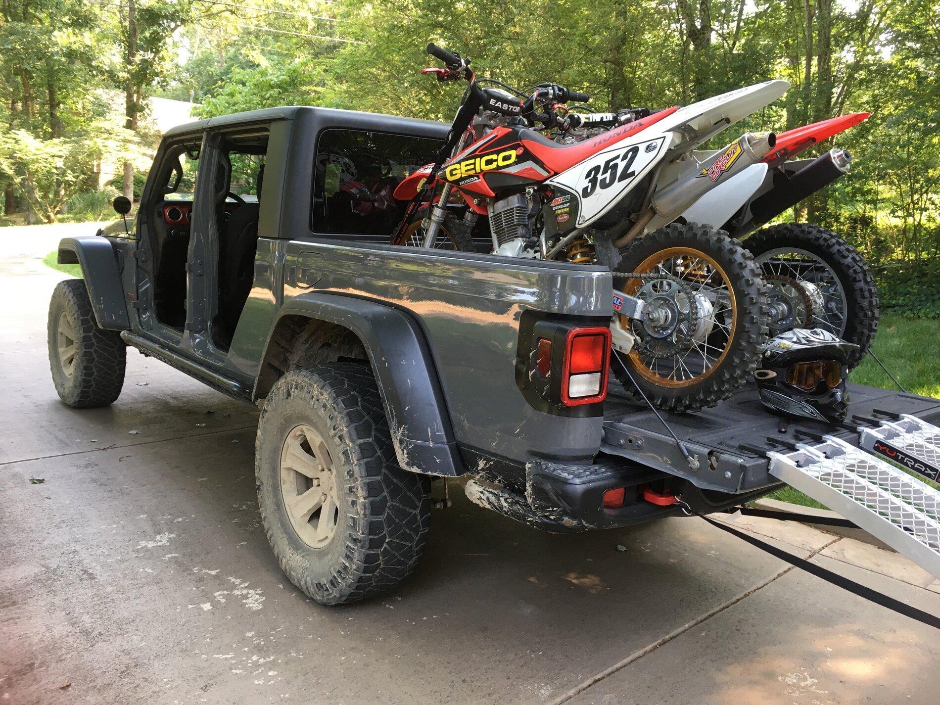 Jeep Gladiator Let's see pictures of dirt bikes or trials motorcycles loaded in the bed. D3E29A0E-0D0A-41DF-AE9C-EA63289298BE