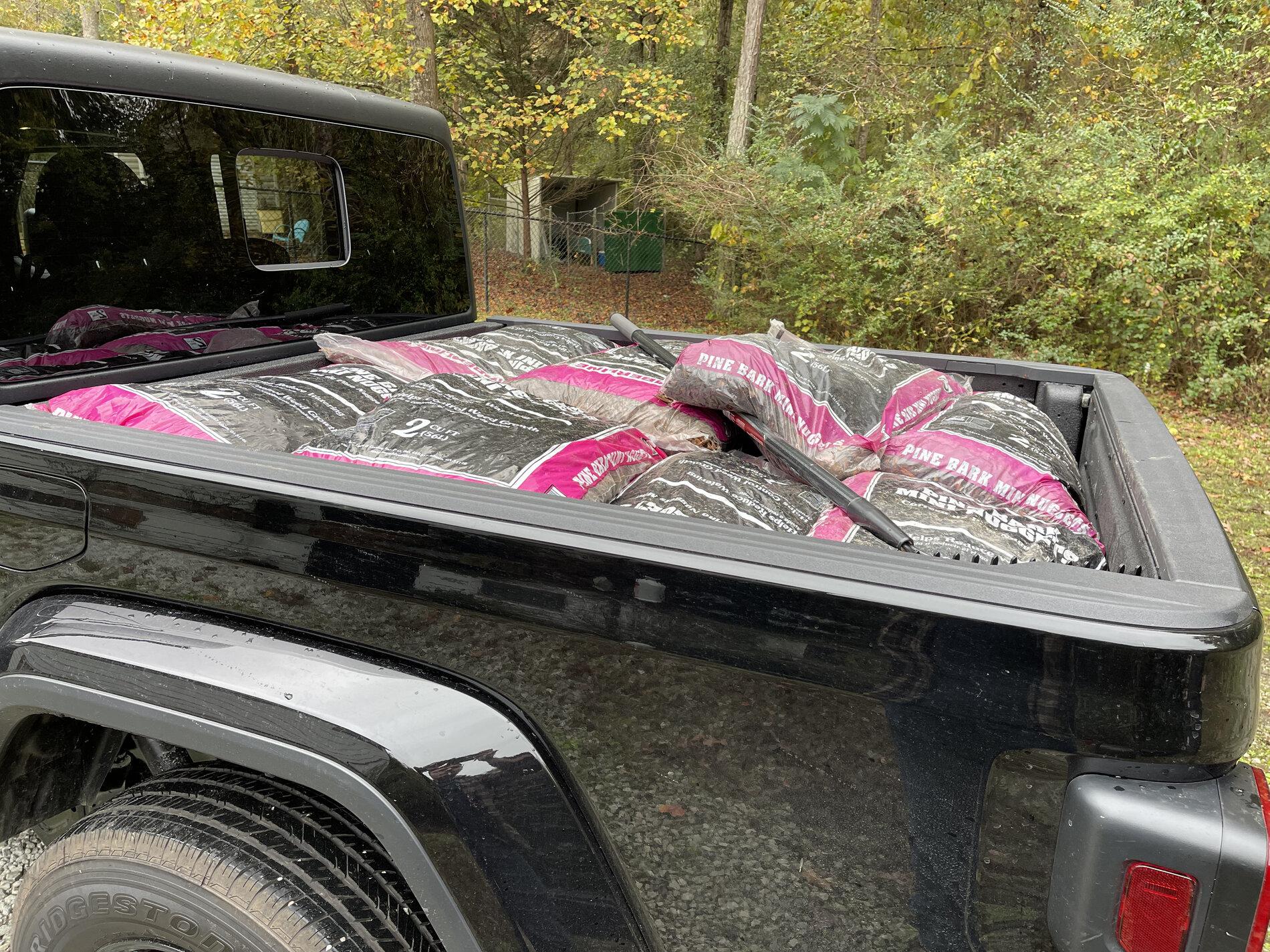 Jeep Gladiator Bags of mulch 172302DC-C07E-4201-9F80-A66481AEFEA3