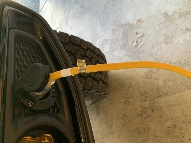 Jeep Gladiator Block heater outlet install 2109F496-CCF9-457B-B00C-EA8E2978507F