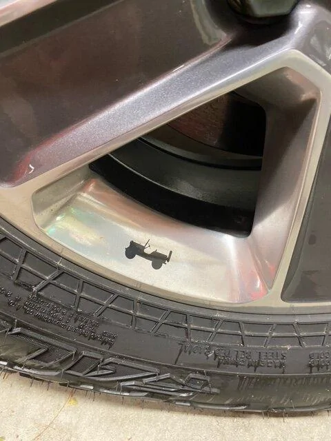 Jeep Gladiator Missing Easter Eggs 2021 Jeep Wrangler Sahara stock silver and black 18in wheel