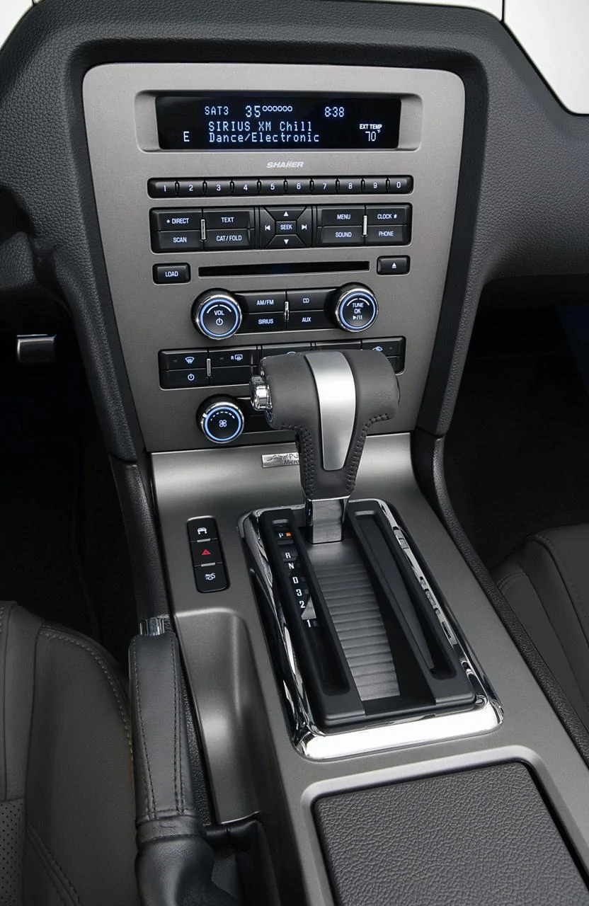 Jeep Gladiator Oh Jeep... Why you so backwards? 2011-ford-mustang-gt-50-interior-center