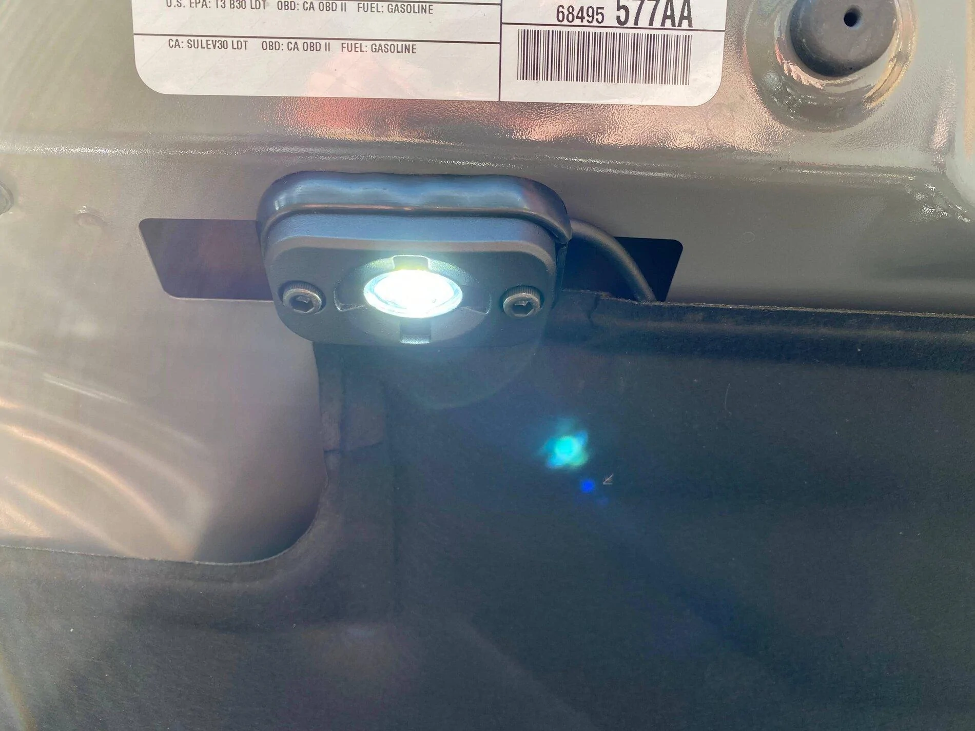 Jeep Gladiator Gas strut activated switch. IMG_3148