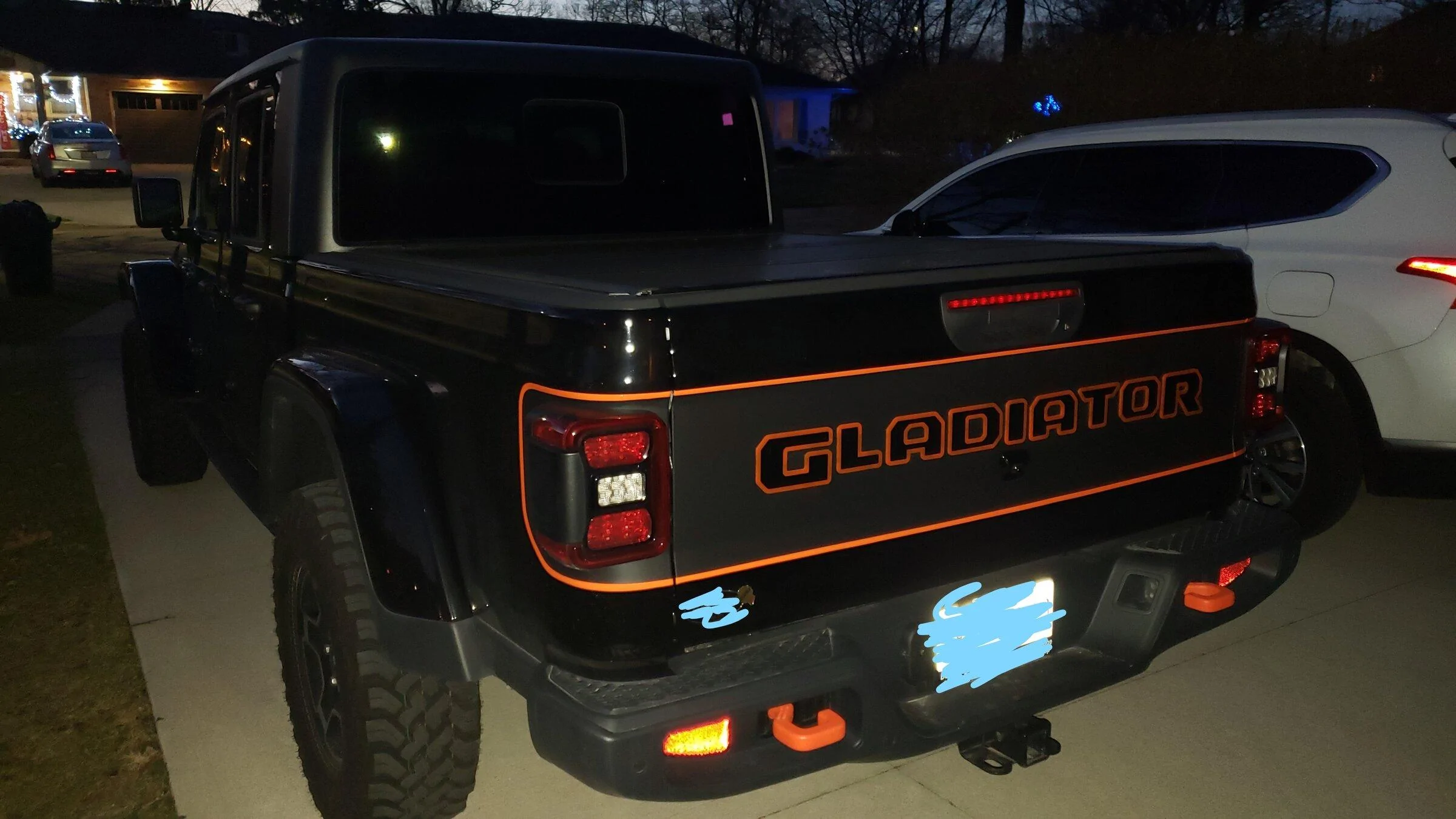 Jeep Gladiator Anyone have an all-black that they've added decals or trim to? jeep back logo dark_LI