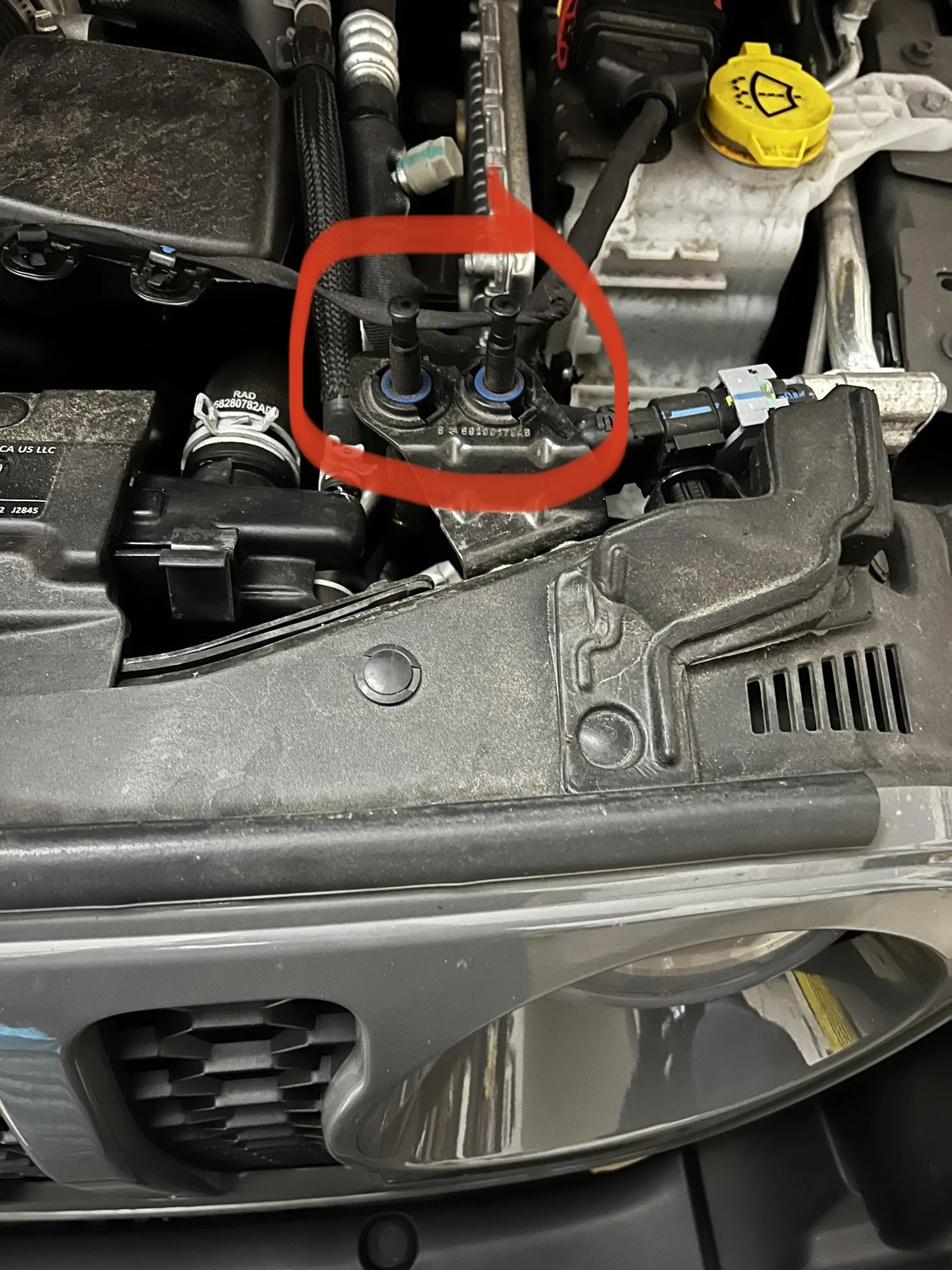 Jeep Gladiator What are these two plunger-type buttons under the hood?? 4316BC20-97DC-48F0-8348-475D2D3630D3