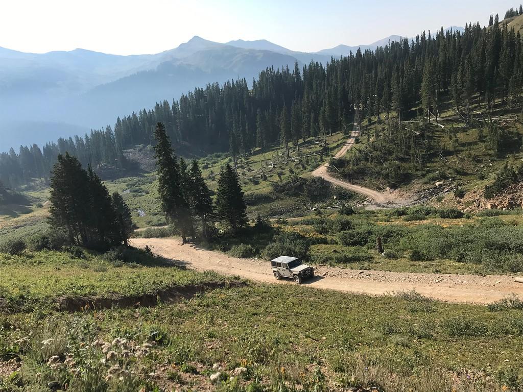 Jeep Gladiator Gladiator on a tight Black Bear Pass switchback. Drone footage. i-hpX3Dpx-XL