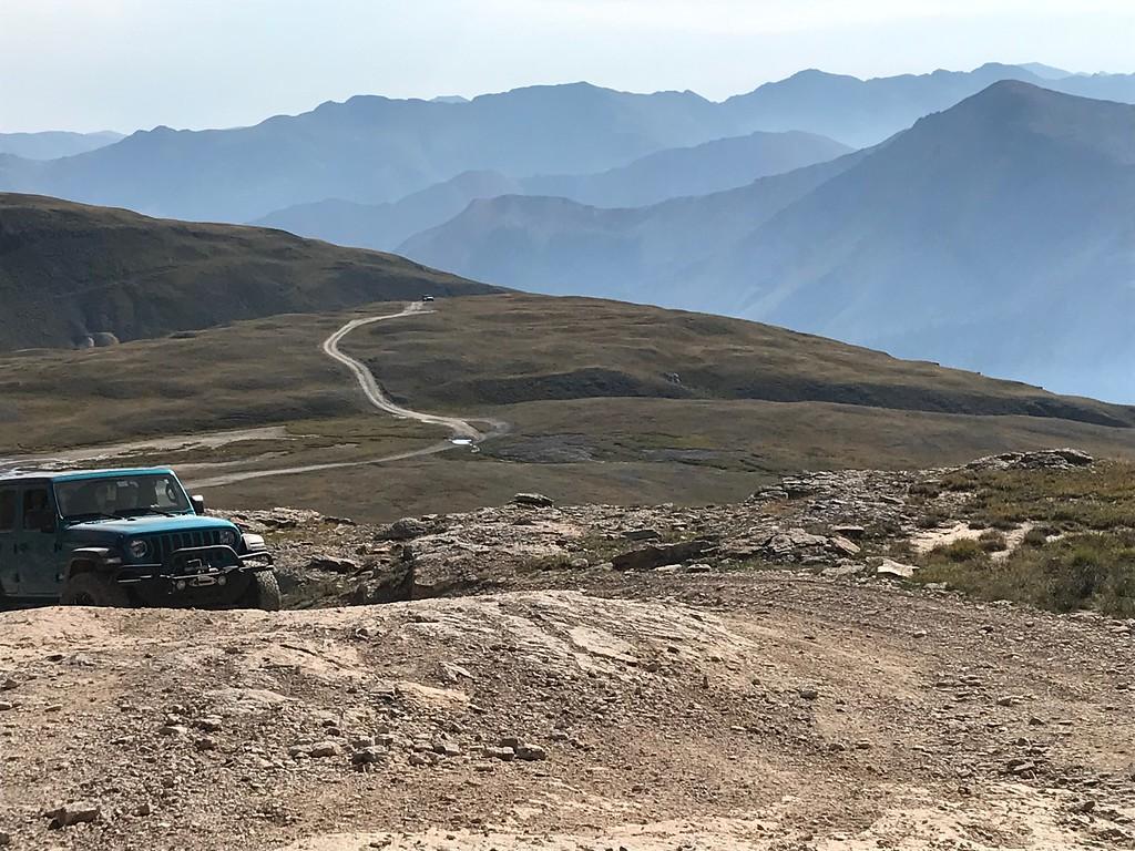 Jeep Gladiator Gladiator on a tight Black Bear Pass switchback. Drone footage. i-WSdqTcv-XL