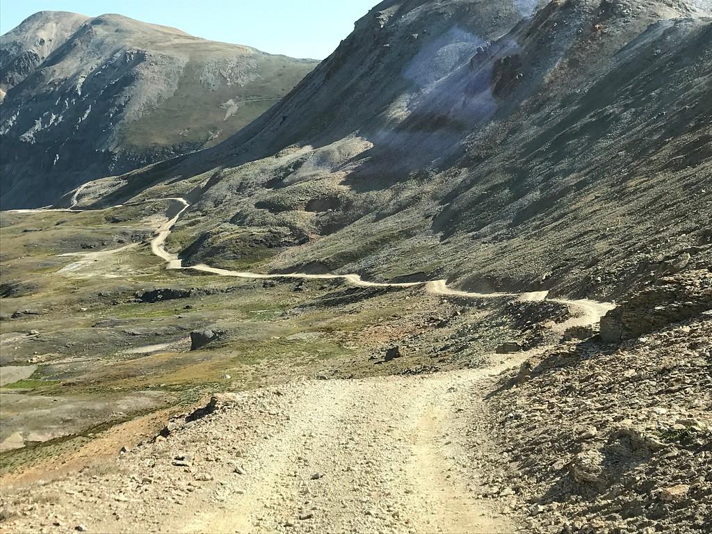 Jeep Gladiator Gladiator on a tight Black Bear Pass switchback. Drone footage. i-6HnvSbL-XL