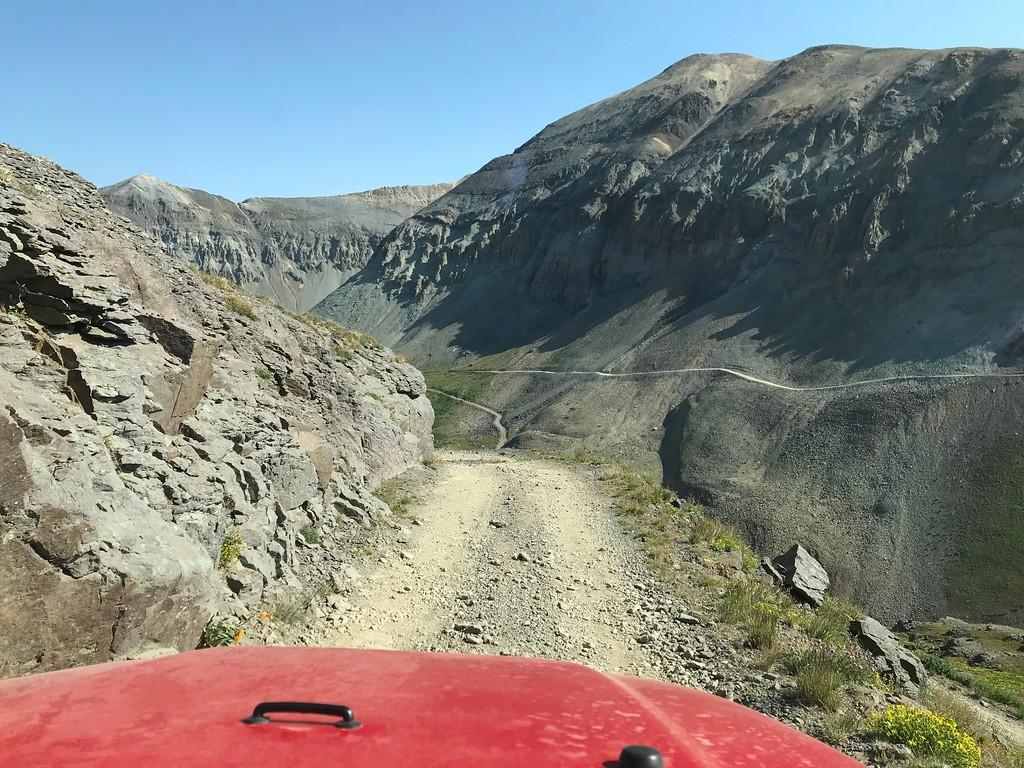 Jeep Gladiator Gladiator on a tight Black Bear Pass switchback. Drone footage. i-RQ2hRCS-XL